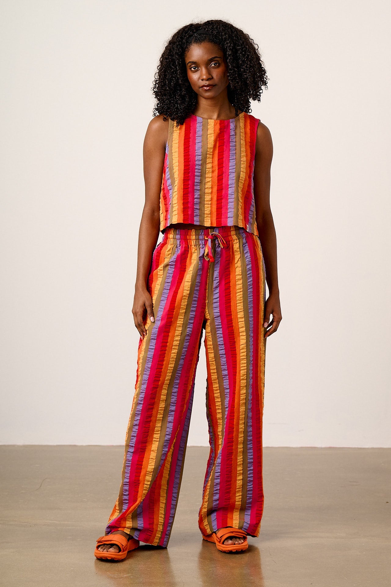 Norris - Wide Leg Cotton Trousers in Wide Rainbow Stripe