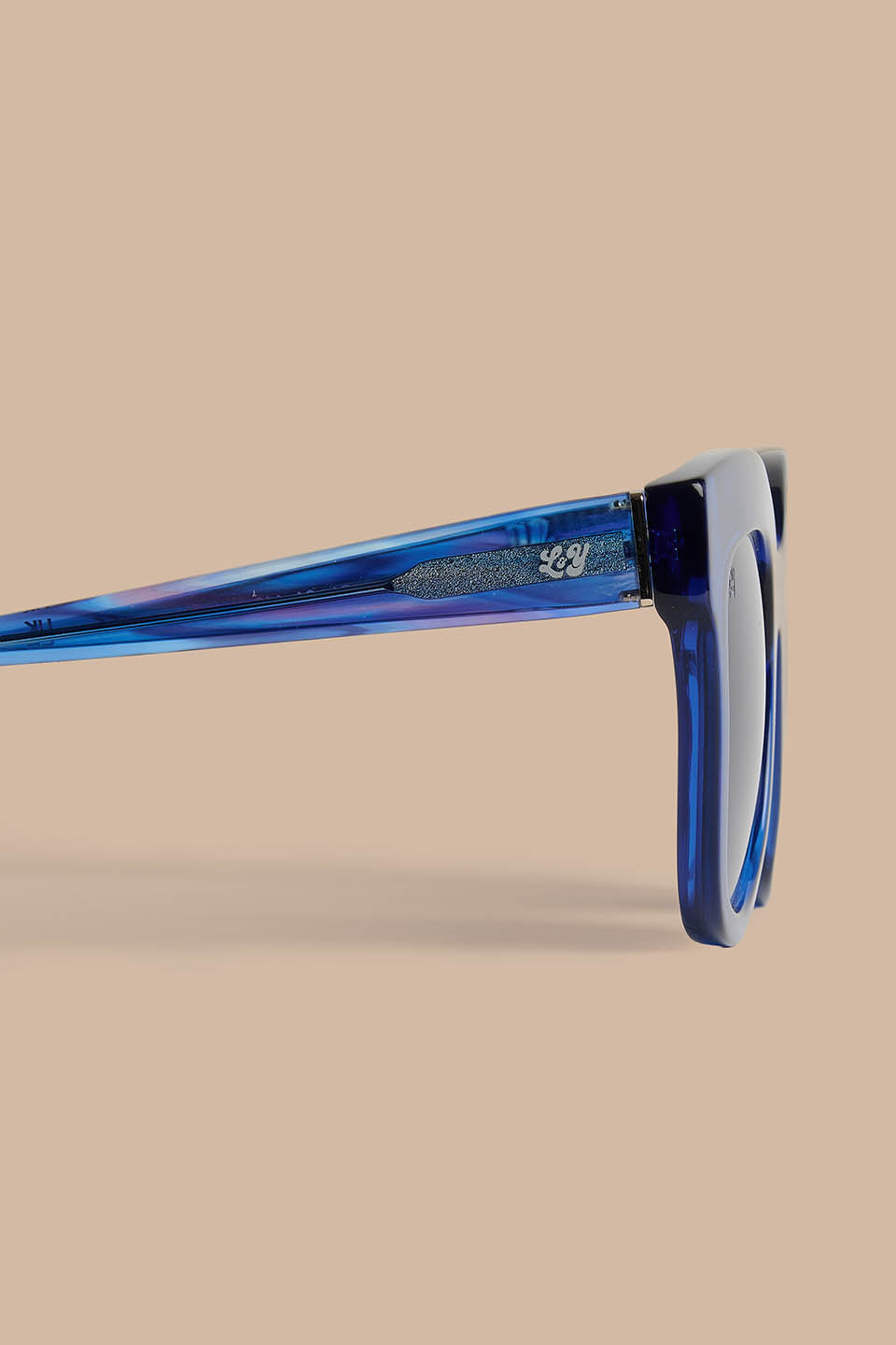Mizuri - Cat Eye Sunglasses in Solid Blue with Blue Swirl