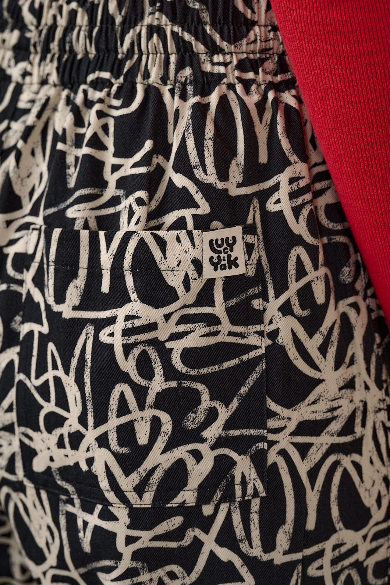 Chuck - Wide Leg Cotton Trousers in Black & White Graffiti Print