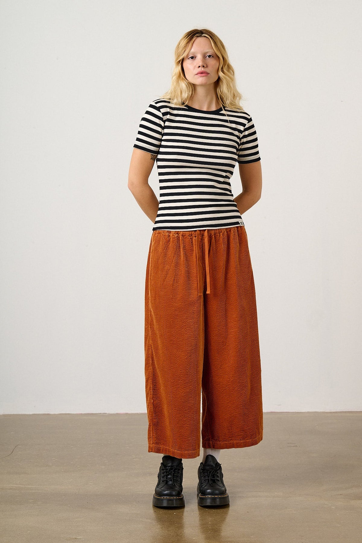 Chuck - Organic Corduroy Wide Leg Trousers in Rust