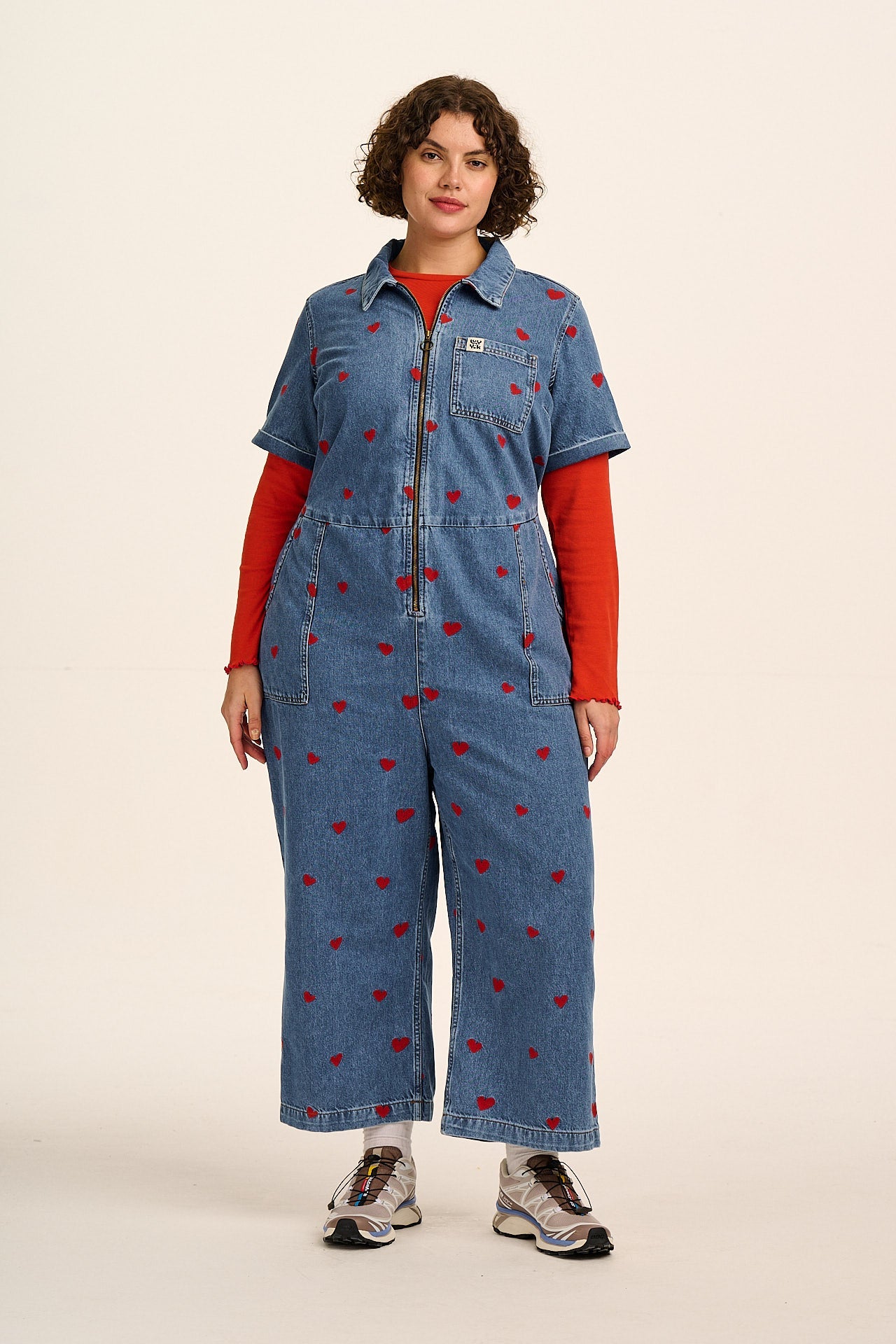 Ragan - Denim Jumpsuit in Mid Wash with Cupid Hearts